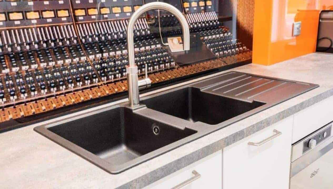 Monnow Valley Studio, Monmouthshire – Professional recording studio kitchen with black composite sink and chrome tap.