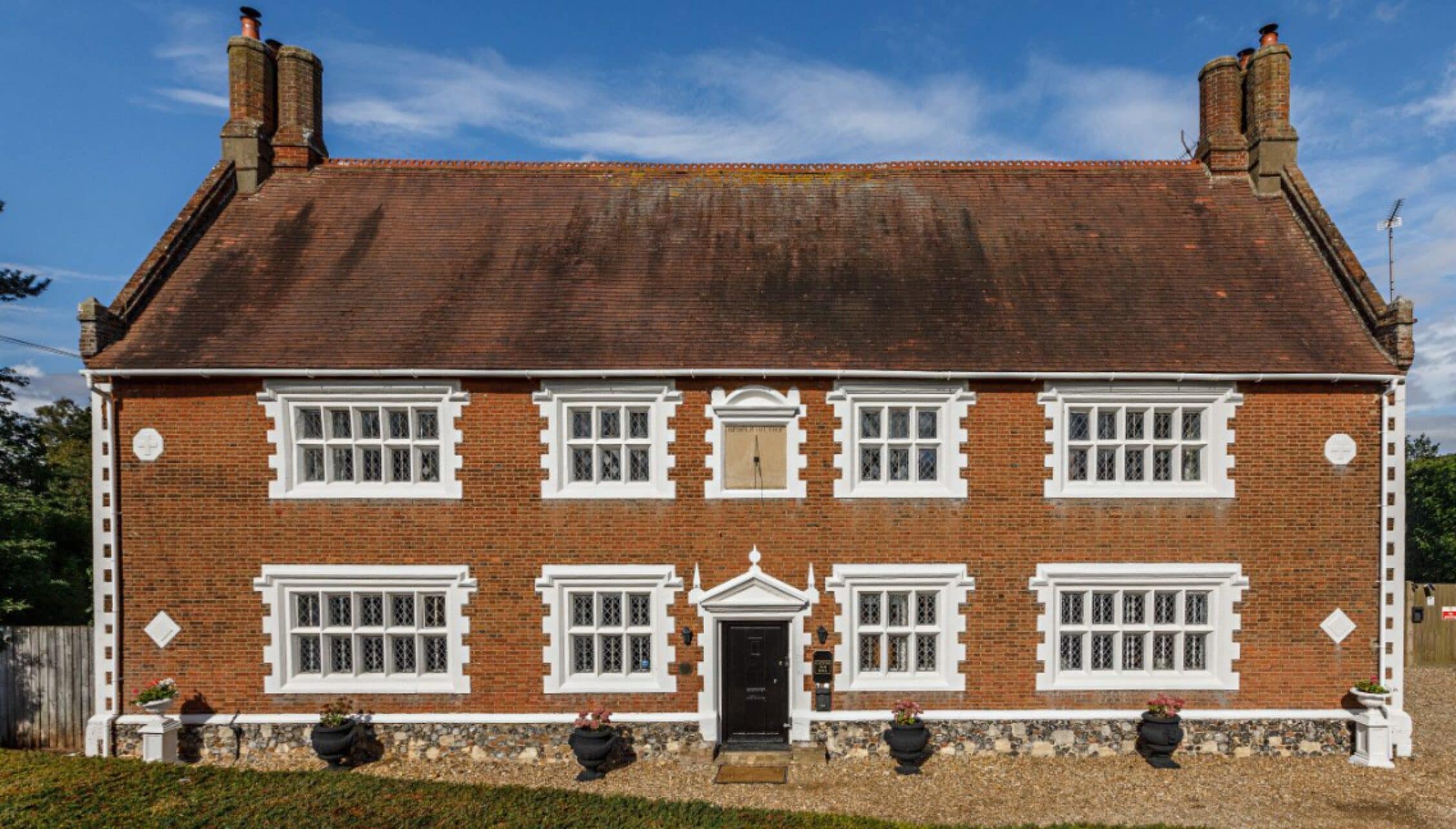 Catton Old Hall, Norfolk – Red-brick Georgian house with white-painted windows and twin chimneys.