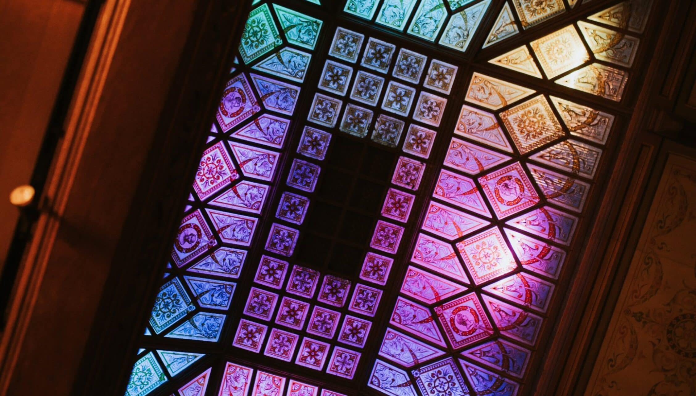Berwick House, Shropshire – Ornate stained-glass ceiling with coloured panes and geometric lead patterns.