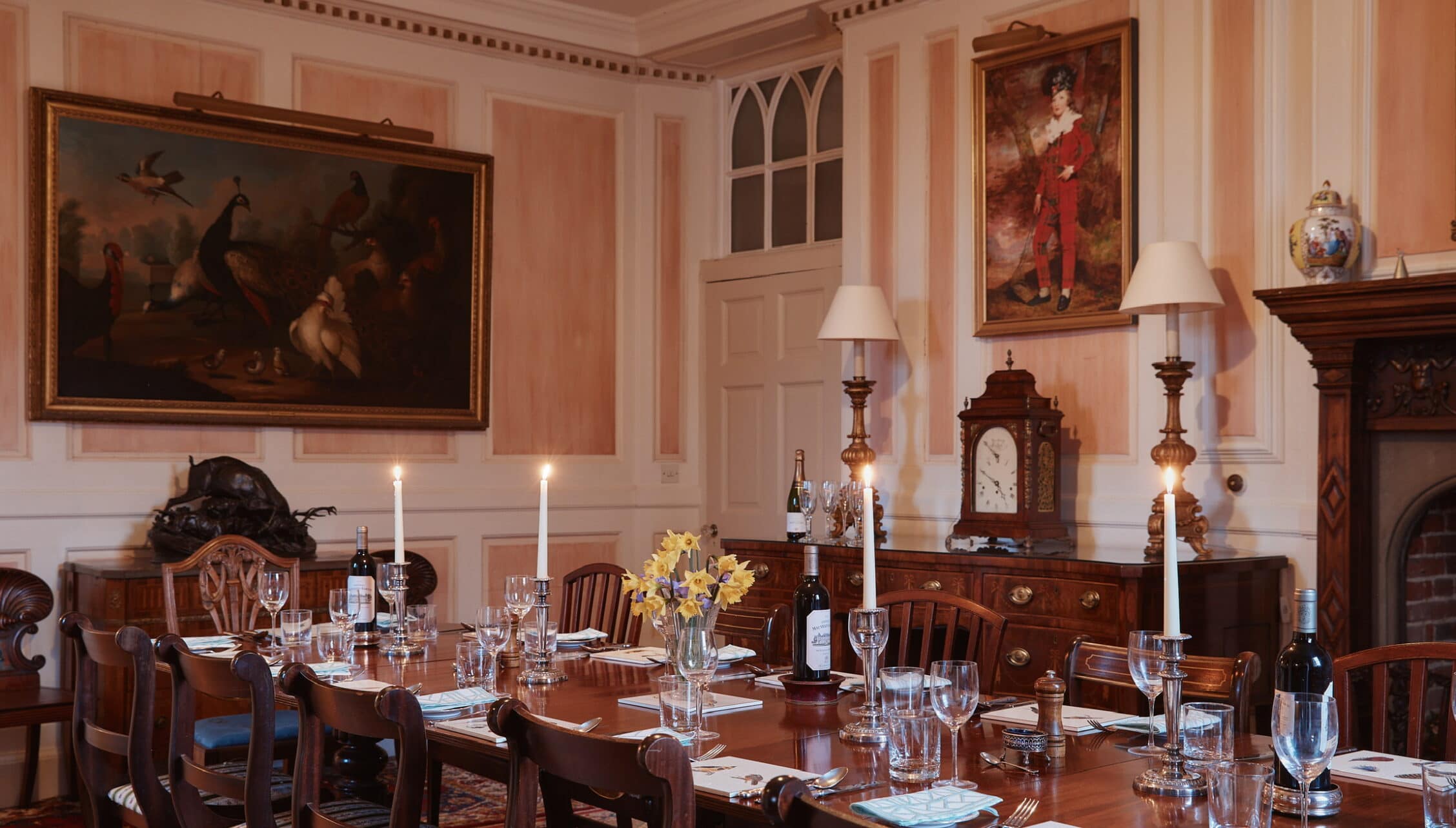 The Old House, Hampshire – Formal dining room with mahogany table, oil paintings and period furniture.