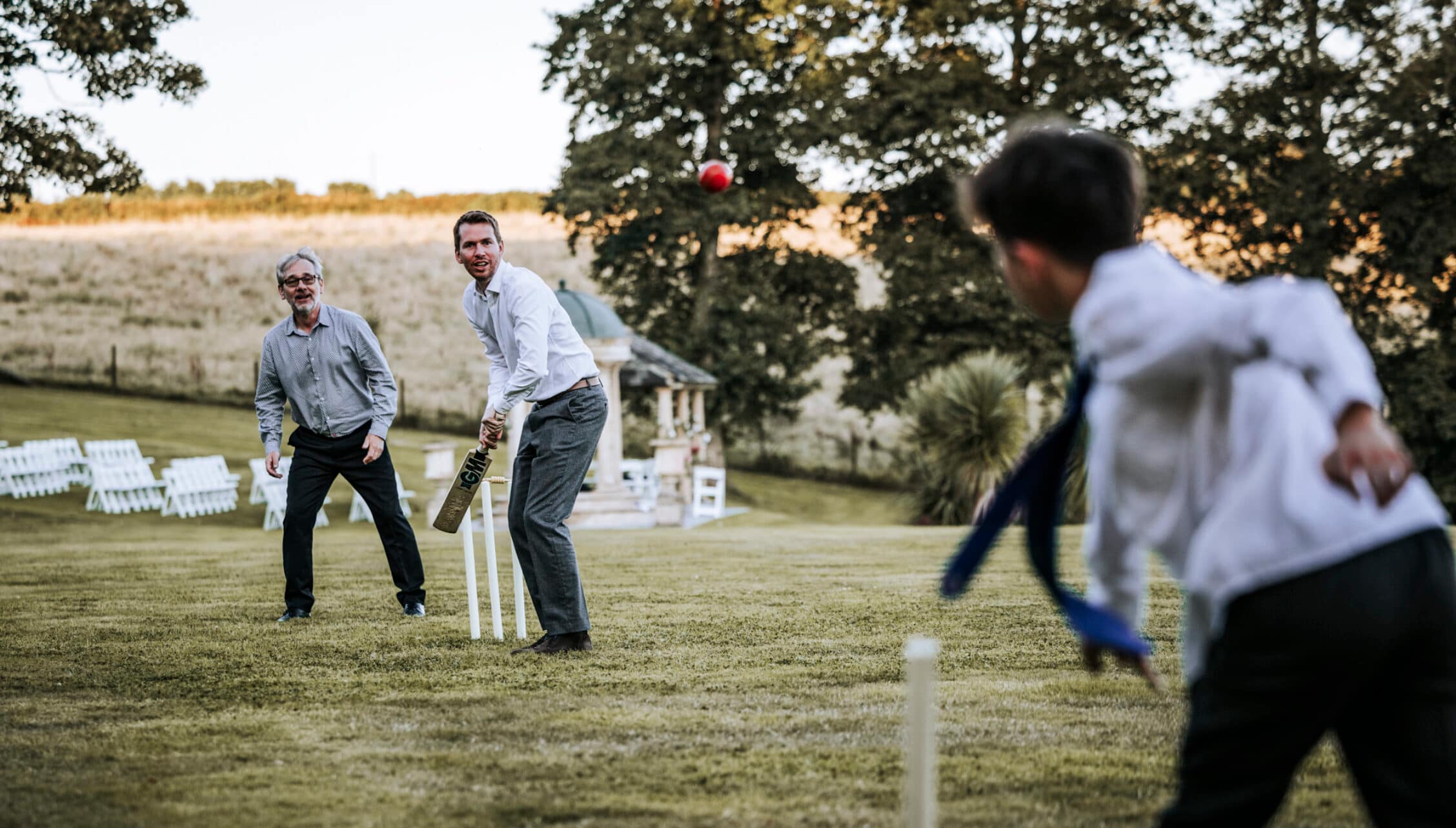 Tredudwell Manor, Cornwall – Guests playing cricket on the manicured lawn with countryside views.