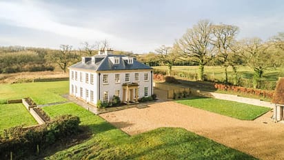 Little Cheriton House – Georgian country house with mansard roof, gravel driveway and manicured grounds.