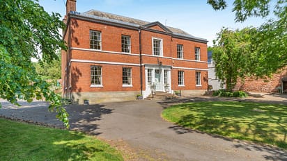 Breedon Hall, Leicestershire – Red brick Georgian manor house with white-framed sash windows and gravel driveway.