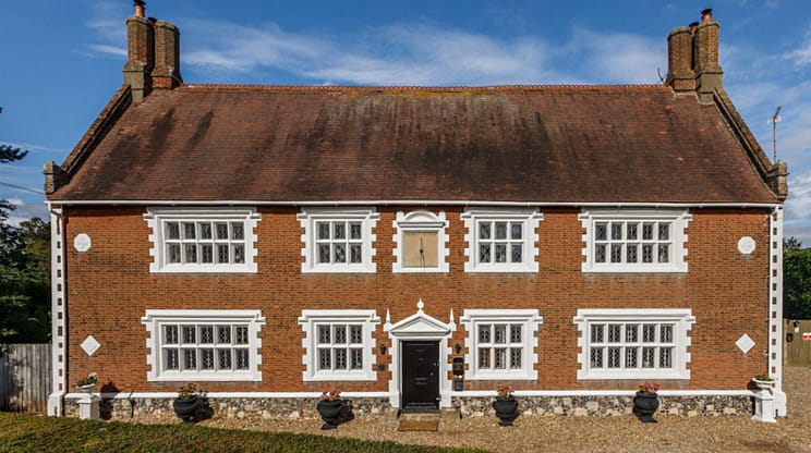 Catton Old Hall, Norfolk – Red-brick Georgian house with white-painted windows and twin chimneys.